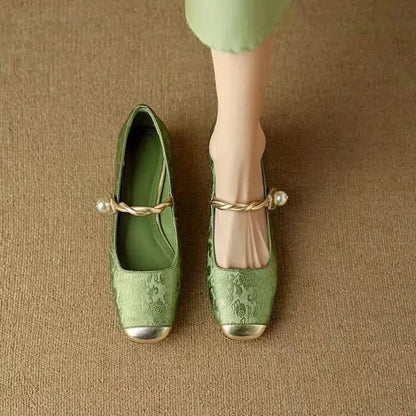 Front view of Valoria women's square toe pumps, highlighting elegant studded details & sophisticated design.