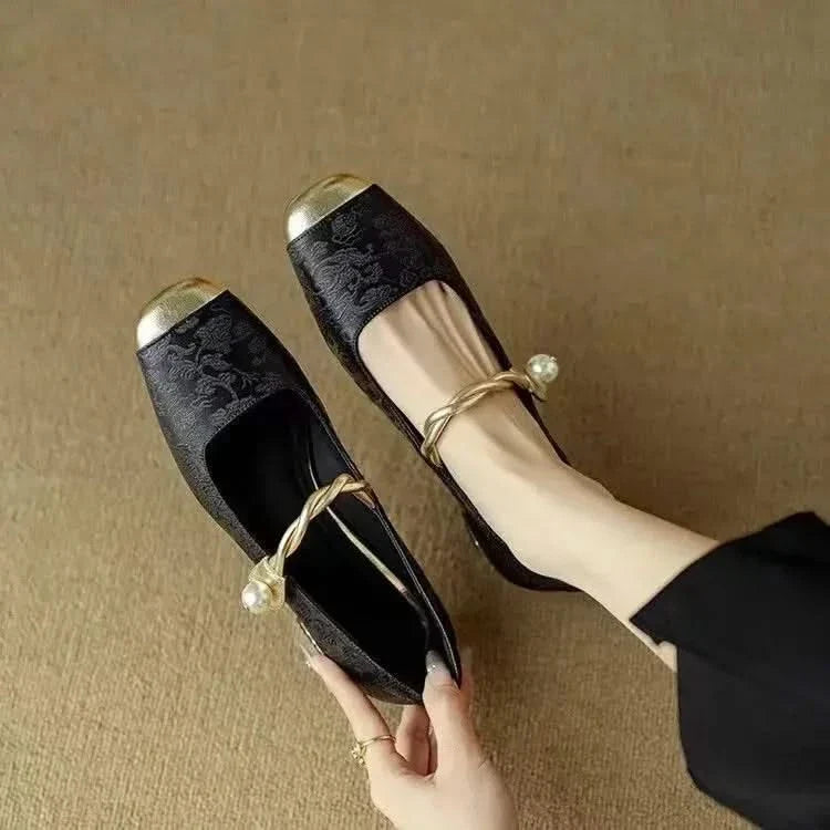 Detailed view of the chic square toe and elegant finish on Valoria women's studded pumps, fashion heels.