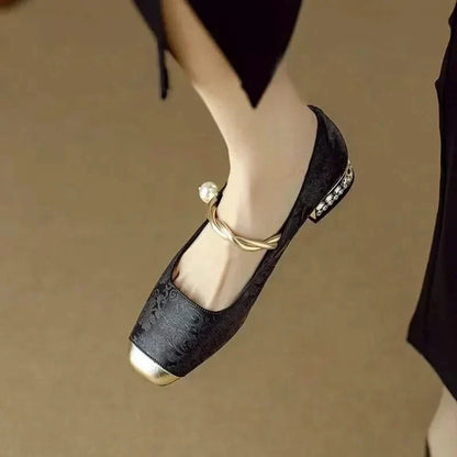 Stylish woman wearing elegant Valoria square toe studded pumps, a perfect fashion statement party shoe.