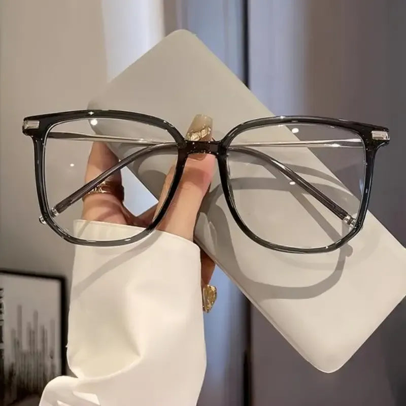 Women's Veloura Acetate sunglasses in stylish gray, offering UV protection. Fashionable eyewear.