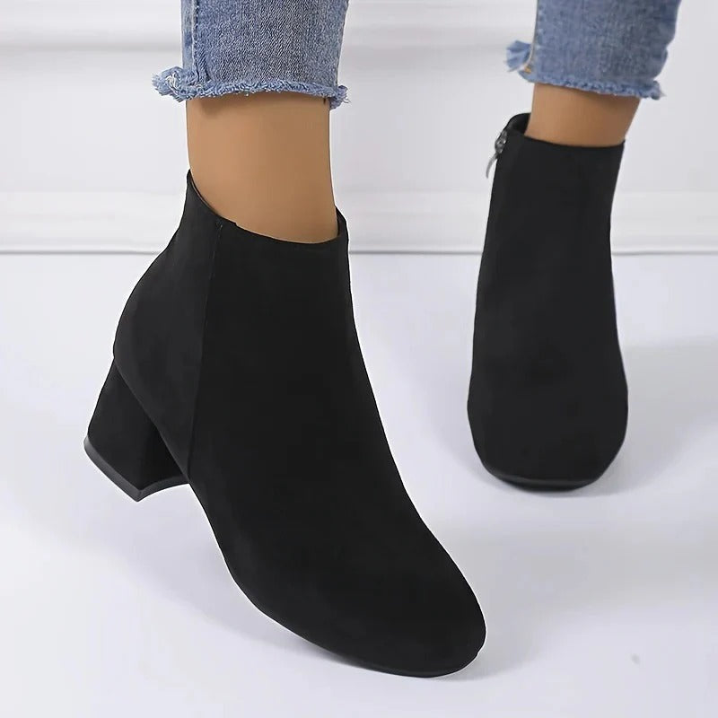 Fashionable women's ankle boots with block heel, side zip. Ideal everyday casual & winter footwear.