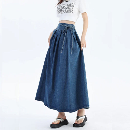Women's versatile blue denim midi skirt, comfortable high waist design for everyday wear & summer fashion.