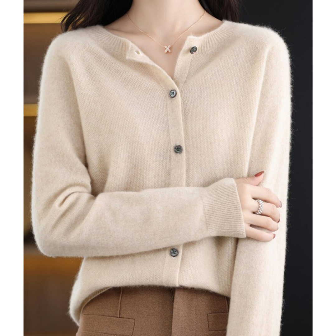 Attractive women's button-front O-neck cardigan, offering both comfort and chic style for any outfit.