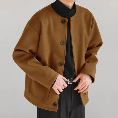 Stylish women's button-up cardigan jacket. Versatile casual outerwear with practical pockets, perfect for layering.
