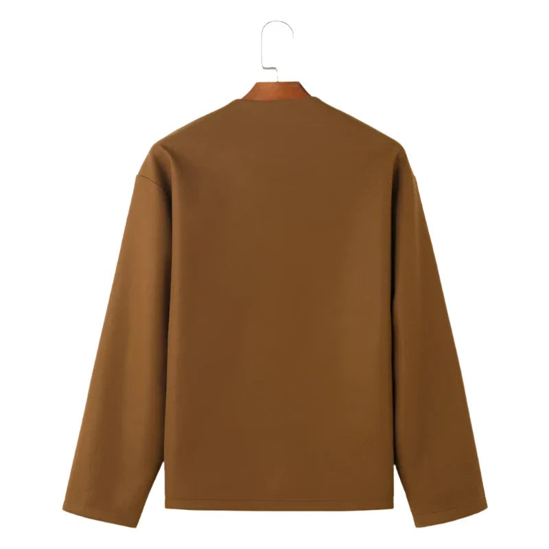 Women's casual button-up cardigan jacket featuring practical front pockets. Versatile layering piece, everyday outerwear.