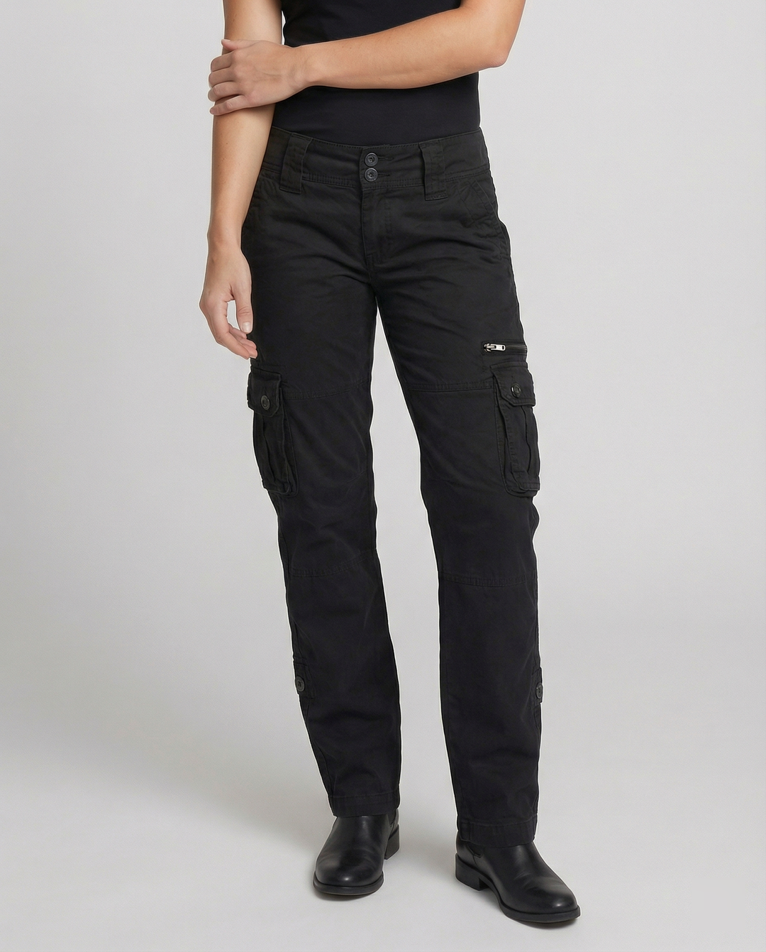 Durable women's cargo utility pants for outdoor adventures. Comfortable travel trousers with multiple pockets.