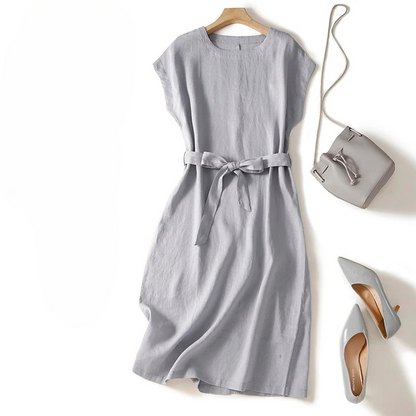 Women's versatile cinched waist flowing midi dress, perfect for summer casual elegance.