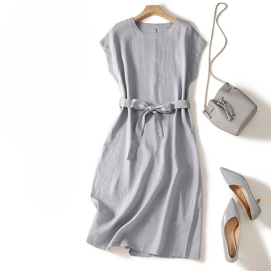 Women's versatile cinched waist flowing midi dress, perfect for summer casual elegance.