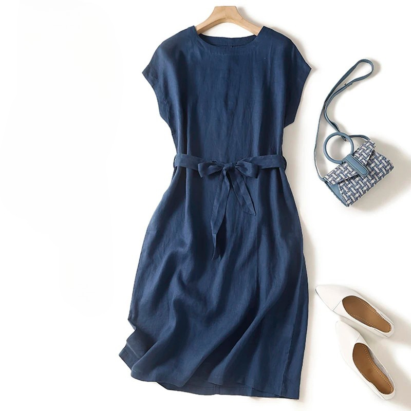 Stylish women's versatile dress featuring a flattering cinched waist and flowing midi skirt.