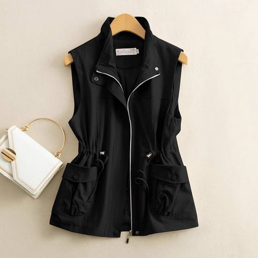 Women's versatile cotton canvas vest with adjustable waist, perfect for casual layering outerwear.