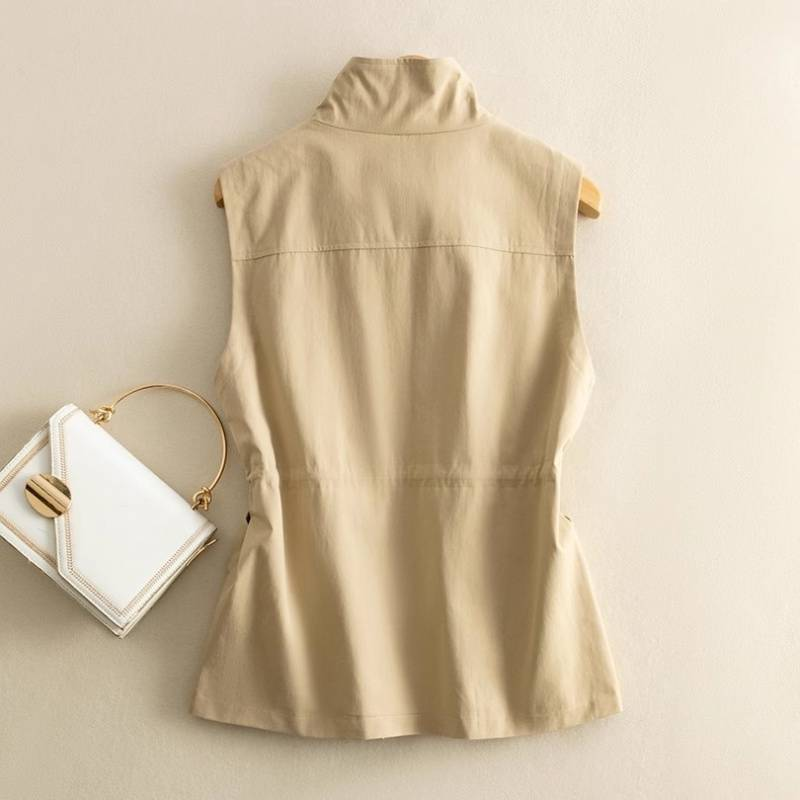 Sleeveless women's canvas vest, featuring an adjustable waist for a custom, comfortable fit.