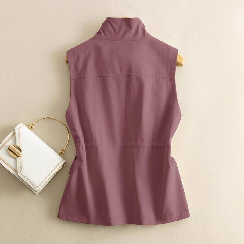 Women's casual utility vest in soft cotton canvas with an adjustable waist for a flattering fit.