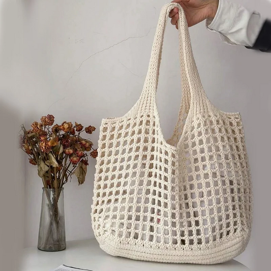 Women's versatile crochet tote bag, perfect for everyday style & a fashionable accessory.