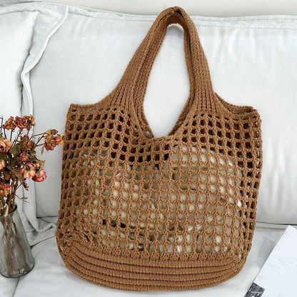Elegant women's crochet tote bag, bringing everyday style and fashion versatility.