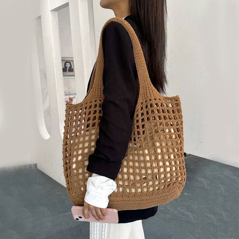 Roomy women's crochet bag, a versatile carryall tote for stylish daily use.