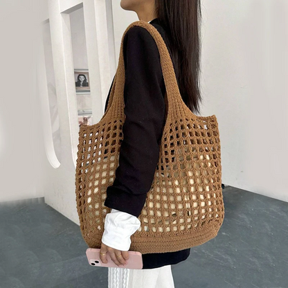 Roomy women's crochet bag, a versatile carryall tote for stylish daily use.