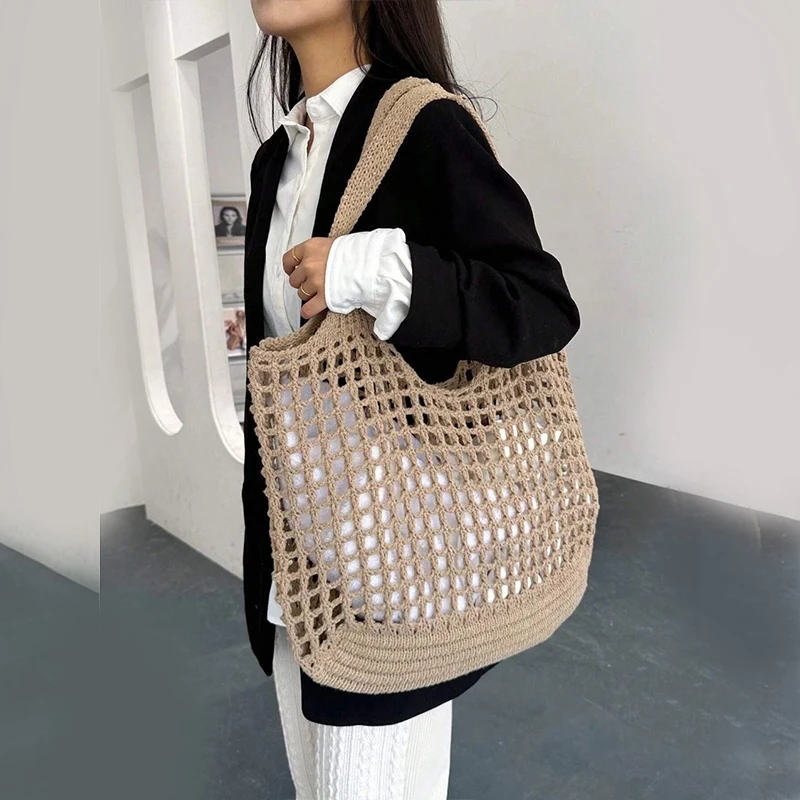 Chic women's crochet tote bag, versatile for beach, travel & daily style.