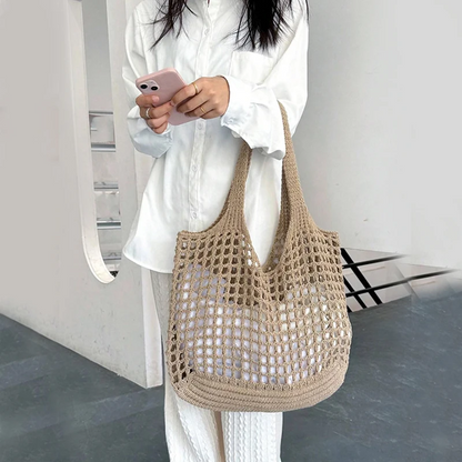 Boho-style women's crochet tote, perfect for versatile everyday & travel fashion.