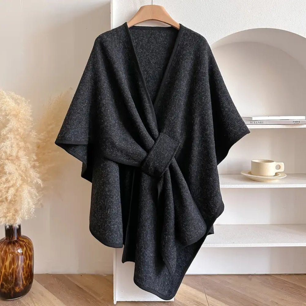 Stylish women's poncho scarf coat, perfect for versatile layering & cozy outerwear.
