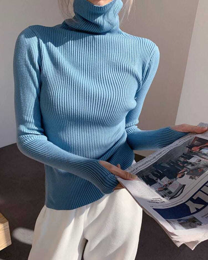 Women's elegant turtleneck sweater, a comfortable long sleeve top for stylish casual wear.