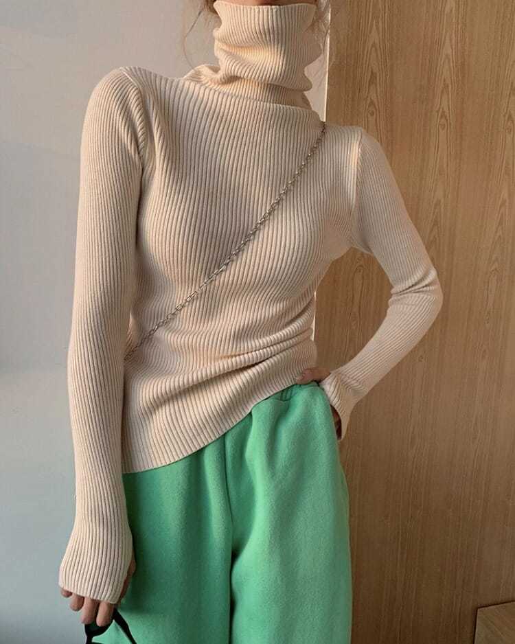 Women's casual fashion turtleneck top, a comfortable layering piece for versatile outfits.