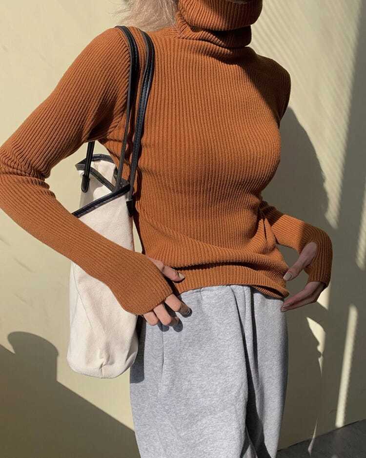 Soft women's versatile turtleneck, a comfortable long sleeve sweater for everyday style.