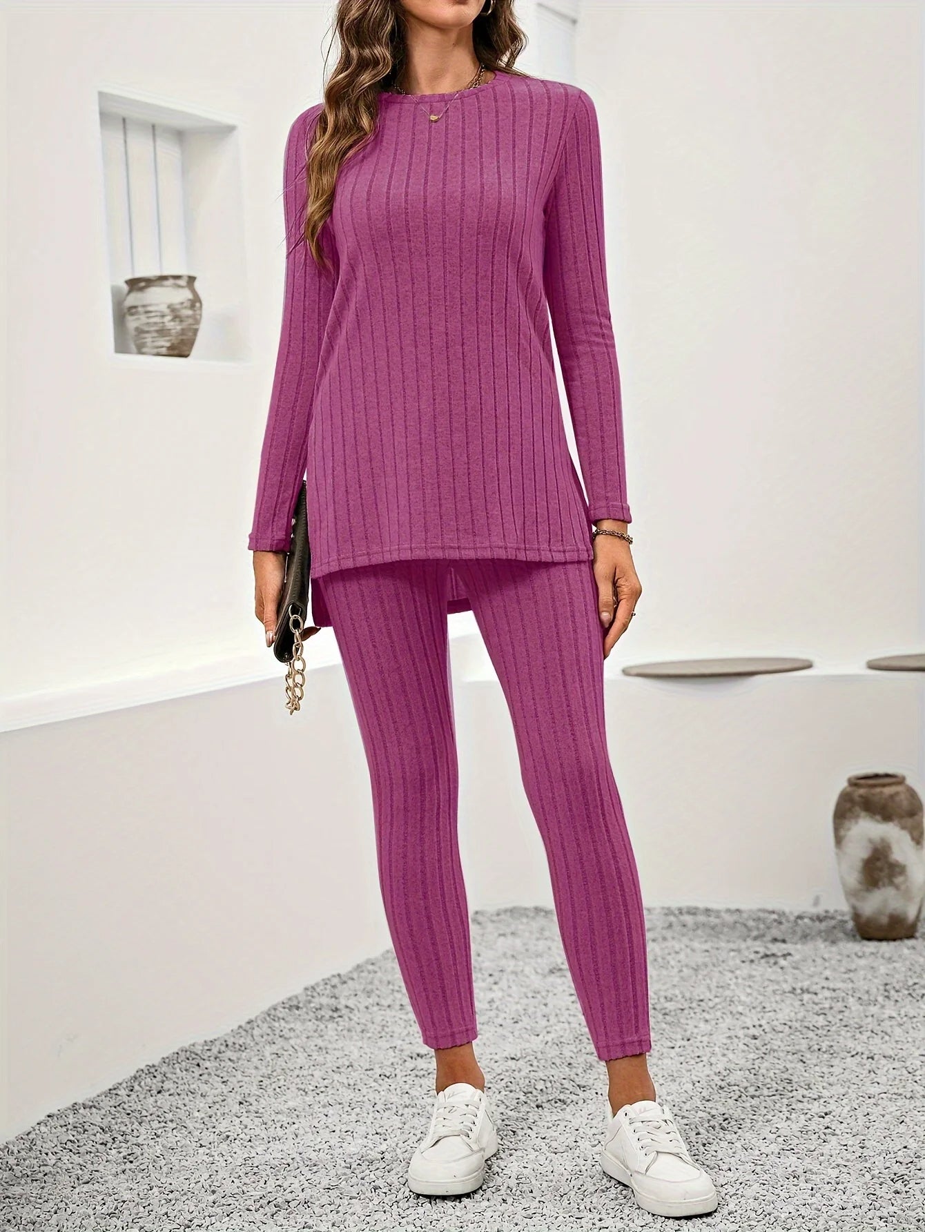 Relaxed women's loungewear set with a comfortable long-sleeve tunic and matching leggings.