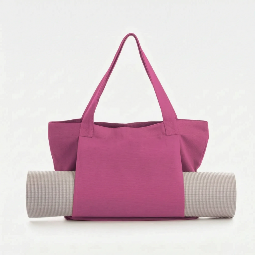 Women's stylish yoga mat shoulder bag. Ideal canvas tote for gym, yoga studio, or daily errands. Versatile & practical.