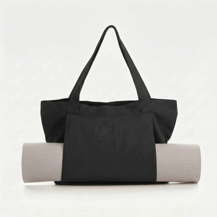 Versatile women's mat bag. Perfect canvas tote for yoga, fitness, gym, and everyday essentials. Comfortable shoulder strap.
