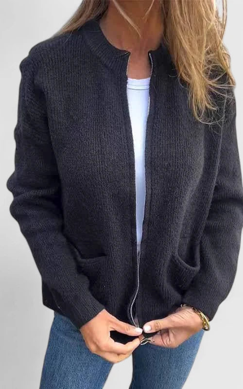 Women's comfortable zipper jacket, ideal for casual everyday style. Features practical pockets & round neck.