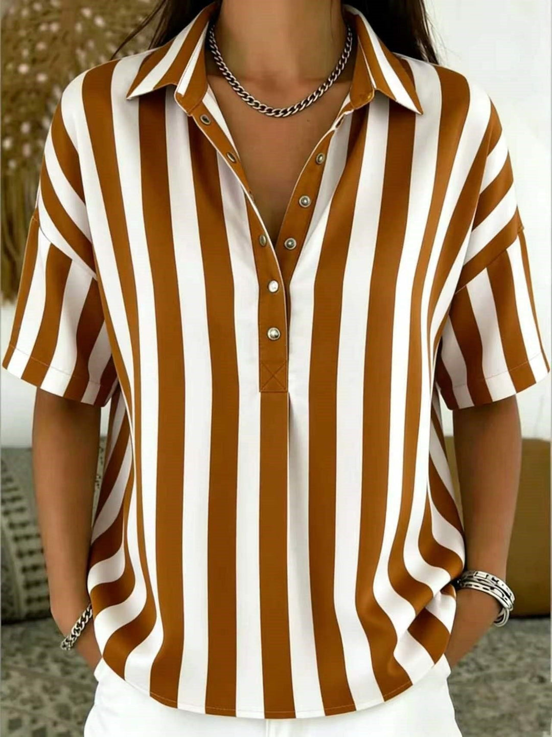 Versatile women's vertical stripe button-up shirt, short sleeve, half-button. Elegant casual spring summer top.