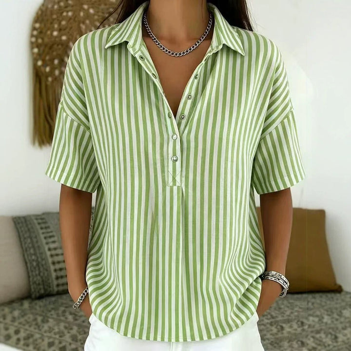 Elegant women's vertical stripe blouse, short sleeve, half-button. Versatile striped shirt for spring summer fashion.