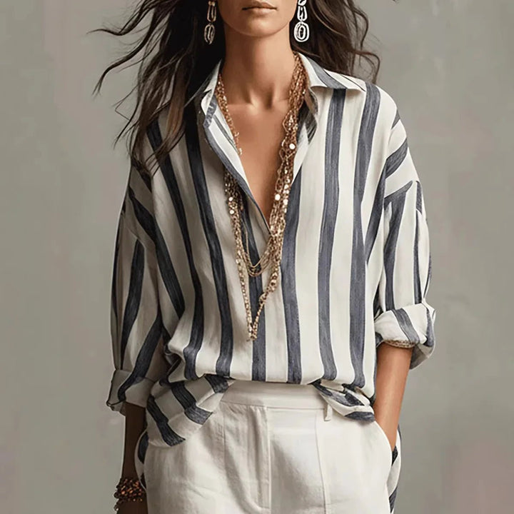 Women's vertical stripe open collar blouse, long sleeve. Relaxed fit for casual or work wear. Available in black, brown, red.