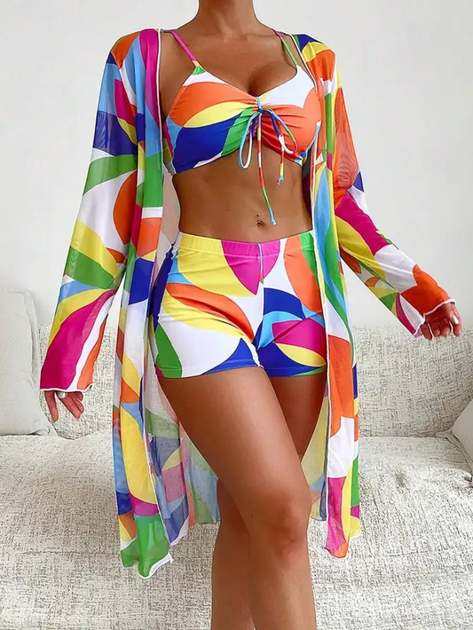 Women's vibrant 3-piece swim set with mesh cover-up, perfect for beachwear & summer fashion.