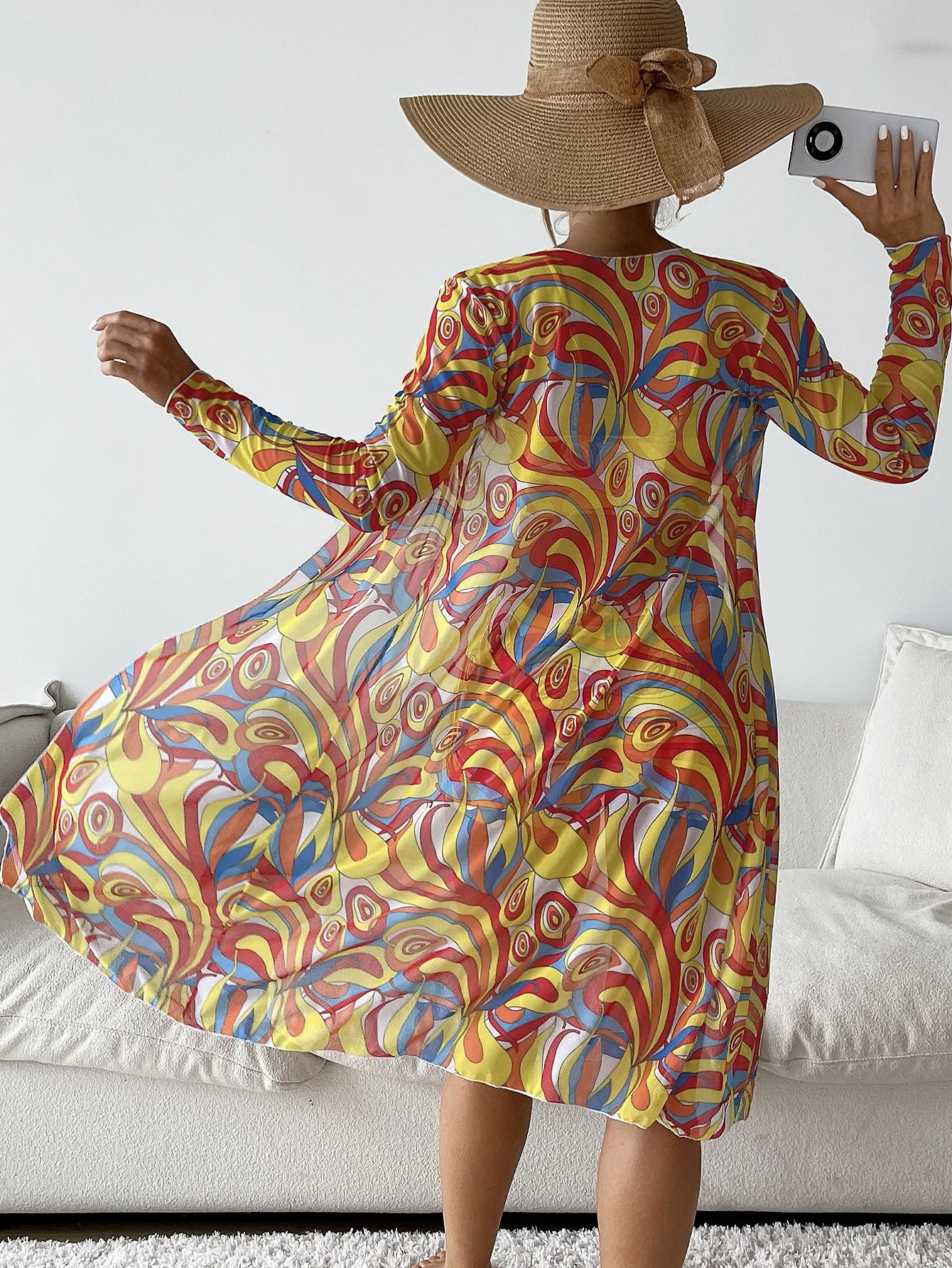 Detail of the stretchy fabric and vibrant print on the women's 3-piece swim set.