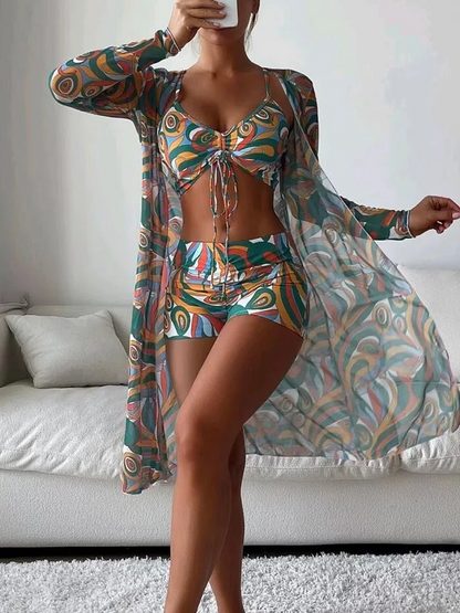 Comfortable and stretchy women's 3-piece swim set featuring a vibrant print.