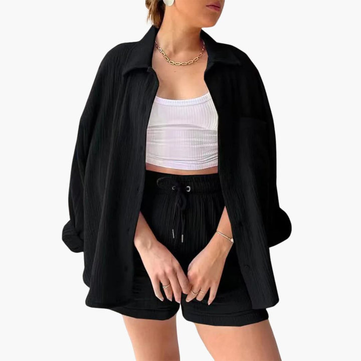 Stylish womens casual two-piece set. Breathable, relaxed fit, perfect for summer.