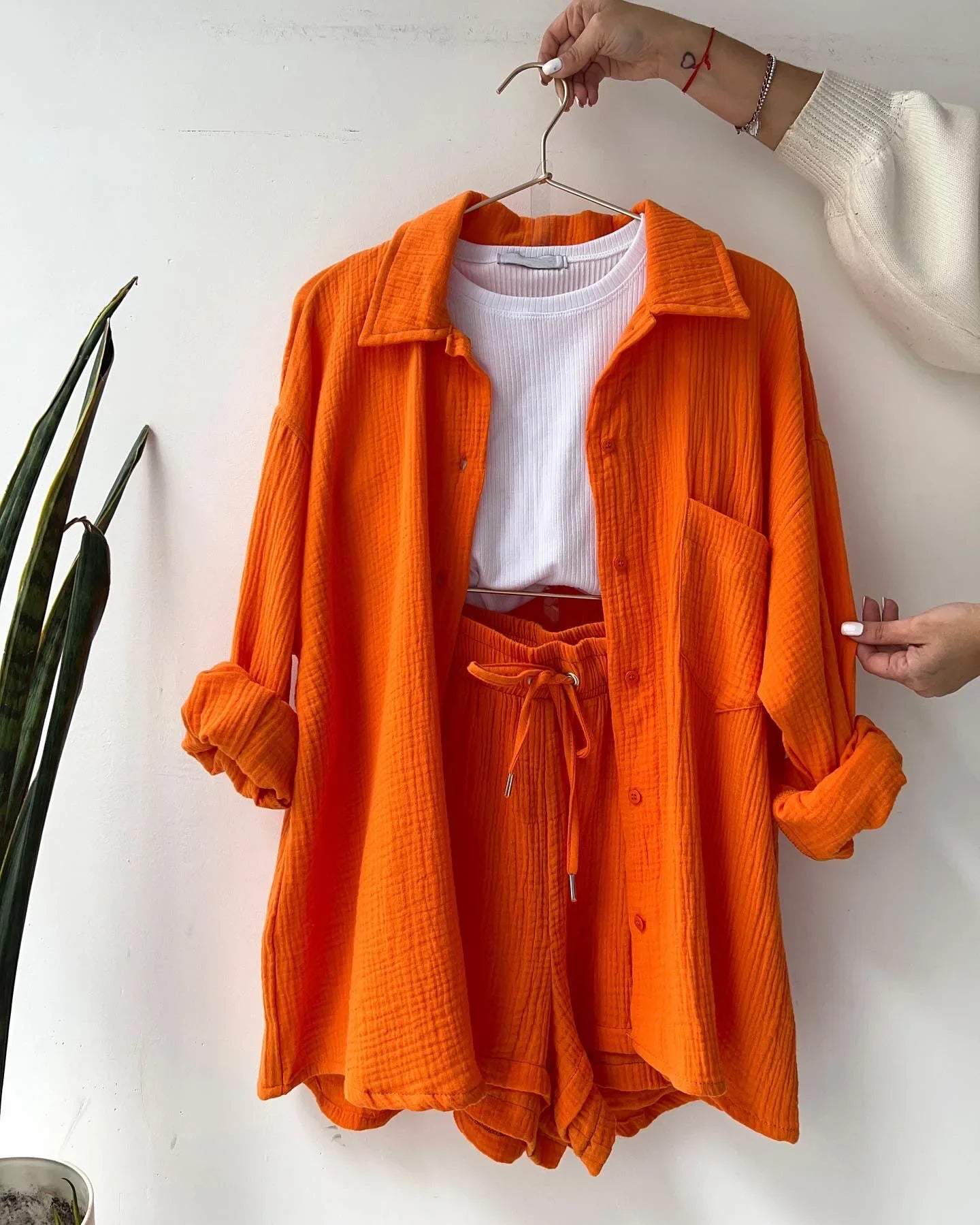 Relaxed fit women's vibrant crinkle top and shorts set, ideal for comfortable summer style.