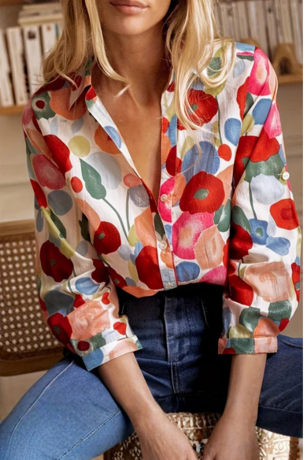Women's vibrant floral button blouse with a relaxed fit. Perfect for spring & summer casual or smart casual wear. Colorful print.