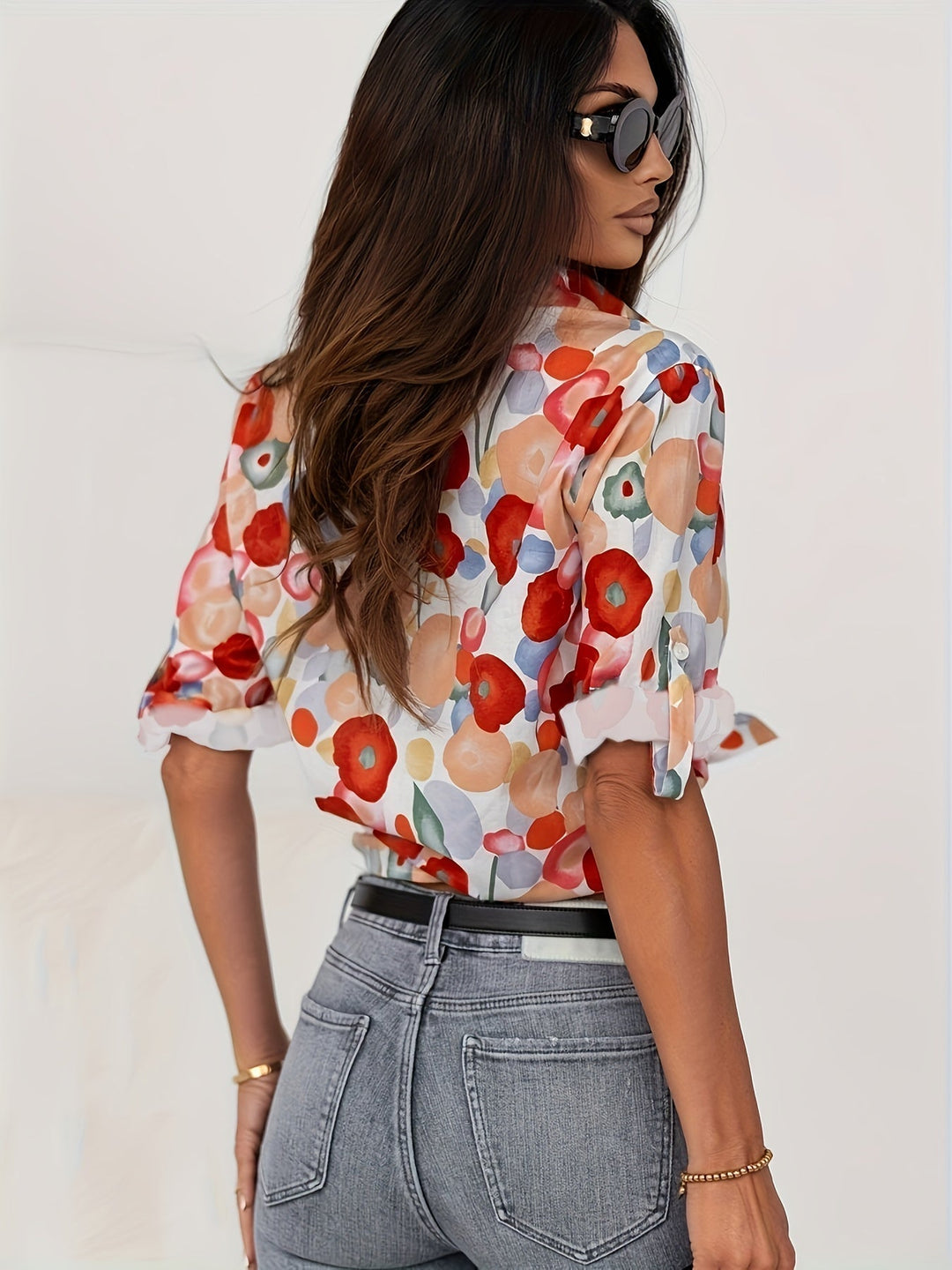 Detailed floral print women's button-down blouse with long sleeves. A versatile casual & smart casual top.