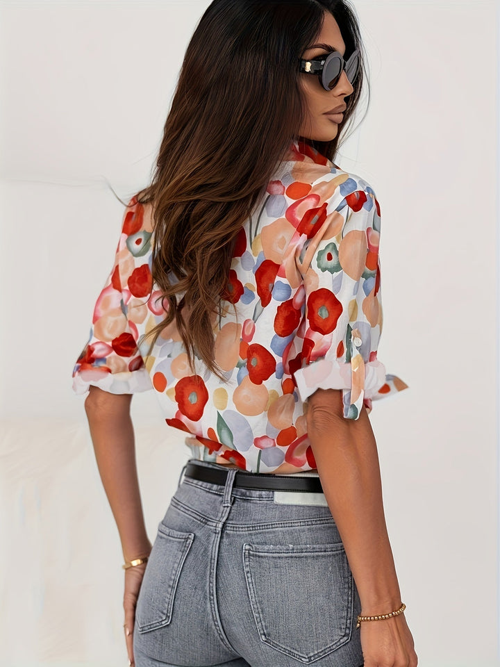 Detailed floral print women's button-down blouse with long sleeves. A versatile casual & smart casual top.