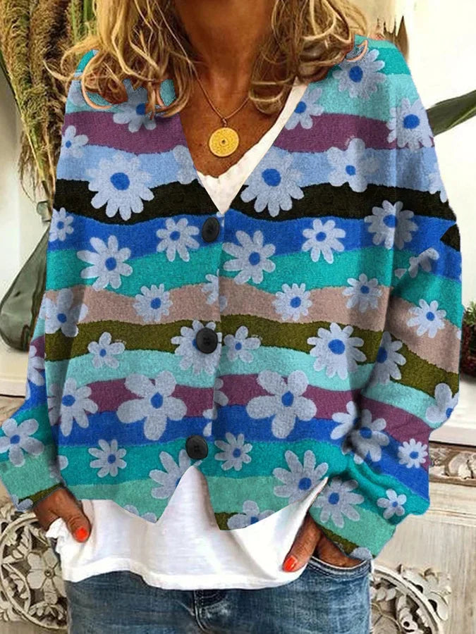 Relaxed fit women's cardigan with vibrant floral and stripe print. Versatile casual wear.