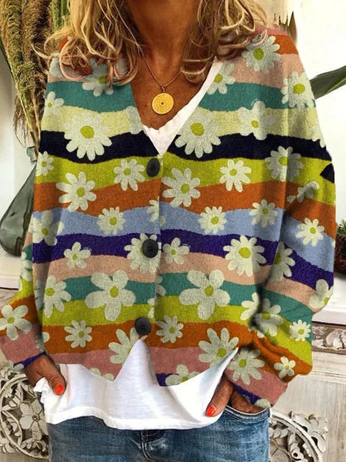 Women's long-sleeve cardigan with unique floral & stripe print. Features functional button closure.