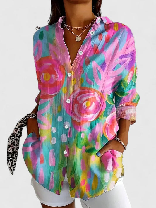 Women's vibrant printed blouse, perfect for versatile summer style or elegant office casual wear.