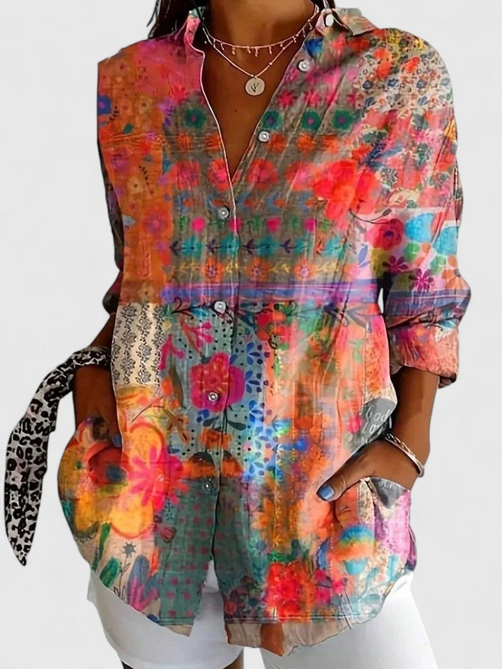 Chic women's printed top with vibrant colors, ideal for casual wear, vacations, or everyday chic outfits.