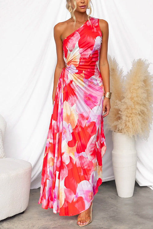 Stunning vibrant printed gown for women, featuring a chic one-shoulder asymmetric design & pleated details. Ideal for parties.