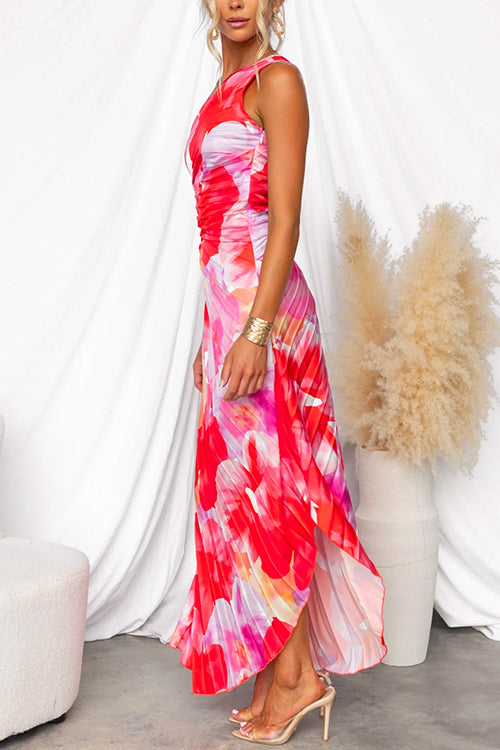 Asymmetric pleated one-shoulder gown, a vibrant printed formal dress for women, ideal for a wedding guest or party.