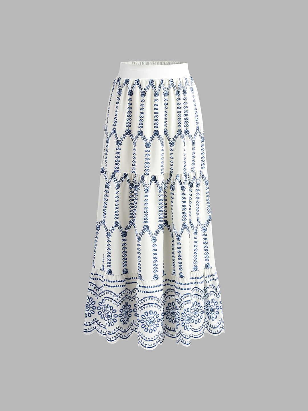 Fashionable women's two-piece printed sleeveless skirt set, a casual summer outfit with a tie-back top.