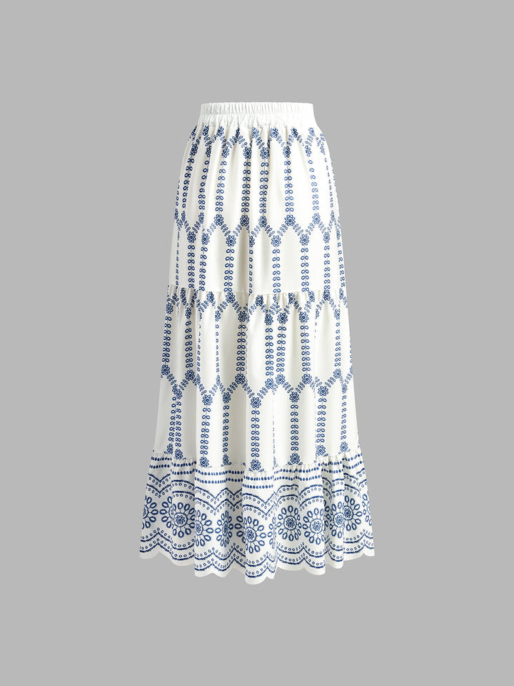 Women's printed sleeveless crop top with tie back and matching flowy mini skirt, a versatile two-piece summer set.