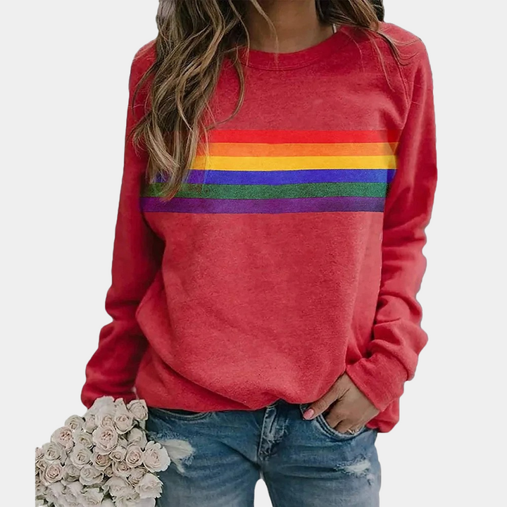 Colorful rainbow stripe crewneck sweatshirt for women. Soft, comfortable, and vibrant, ideal for casual layering.